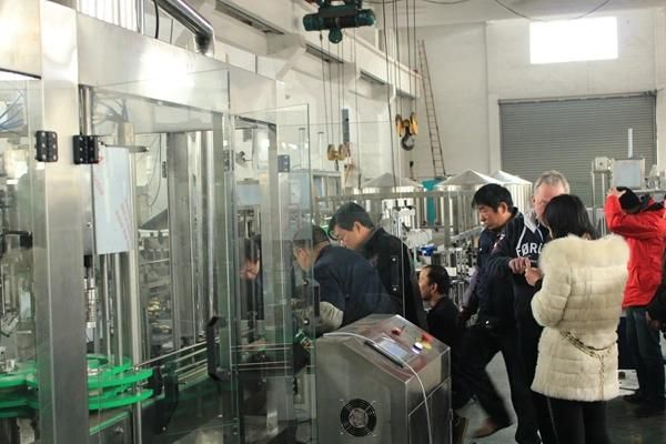 China Carbonated Rotary Washing Drink Filling Machine Suppliers