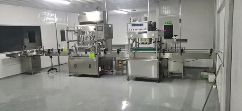 Automatic Small Bottle Liquid Filling Capping and Labeling Machines Bottle Packing Filling Machine Production Line for Bottling
